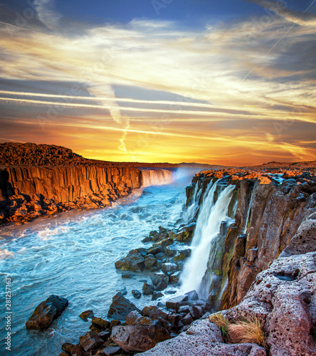 Charming magical view with famous waterfall Selfoss in Iceland at sunrise. Exotic countries. Amazing places.  Meditation  antistress - concept .