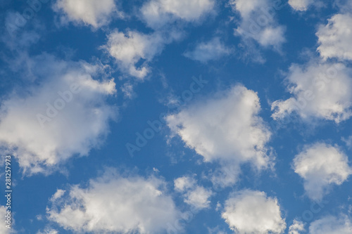 Blue sky background with clouds © Pitcher