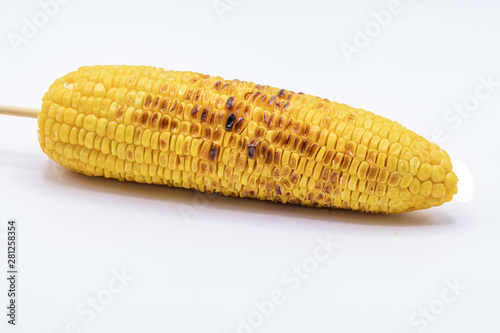 Close up grilled sweet corn with butter isolate on white background.