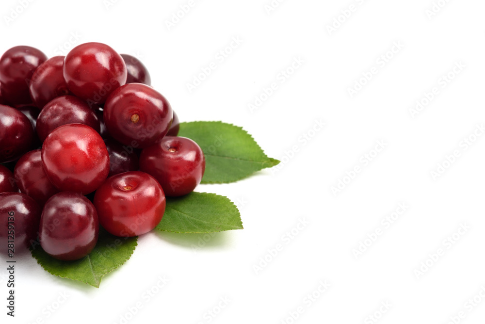 Ripe cherry berries on a white background, close-up Ripe cherry berries on a white background, close-up