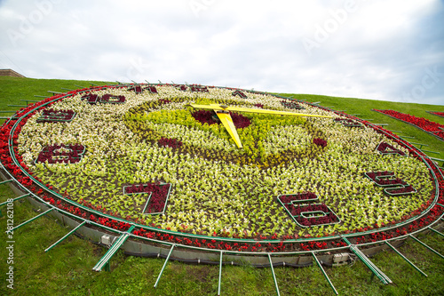Flower clock on Poklonnaya Hill on a Sunny day. Moscow attractions of World tourism