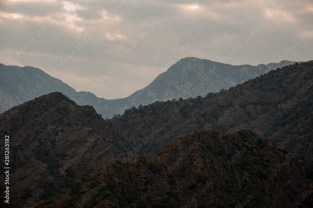 Landscape of the mountain under the cloudy sky with light Landscape of the mountain under the cloudy sky with light