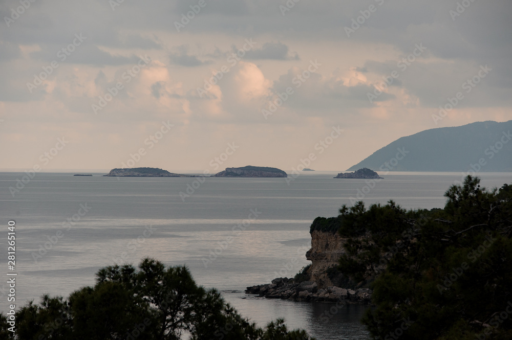 Breathtaking bird's-eye landscape on the mountain and island in the sea in the foreground of trees