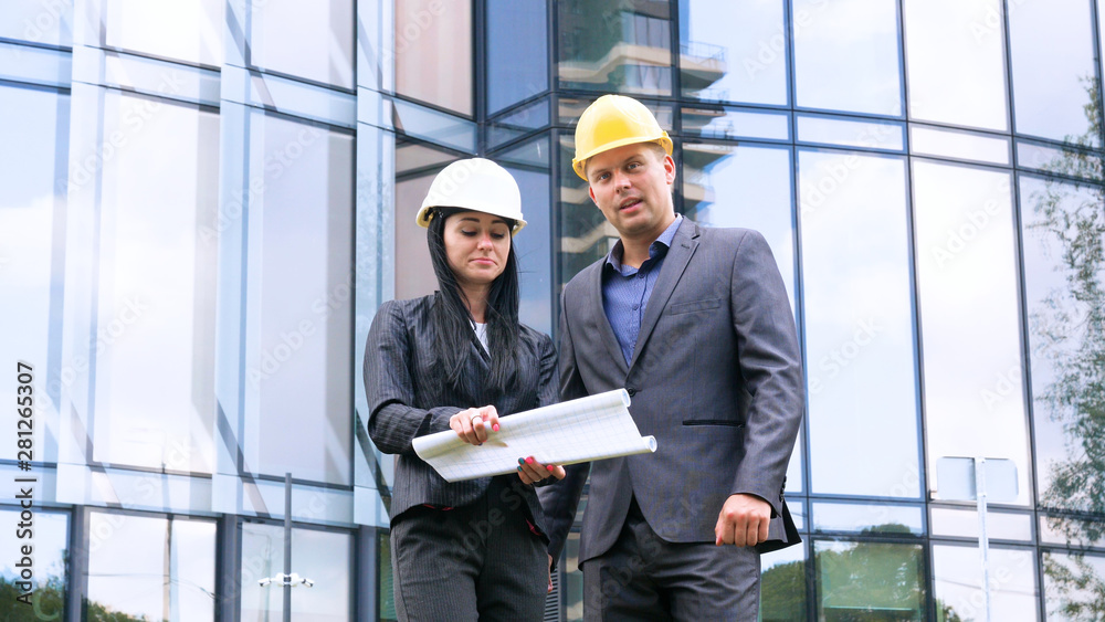 Team of architects and engineer in group on construciton site check documents and business workflow. Engineer inspection in workplace for architectural plan. Concept of: Woman, Man, Suite, Business. Team of architects and engineer in group on construciton site check documents and business workflow. Engineer inspection in workplace for architectural plan. Concept of: Woman, Man, Suite, Business.