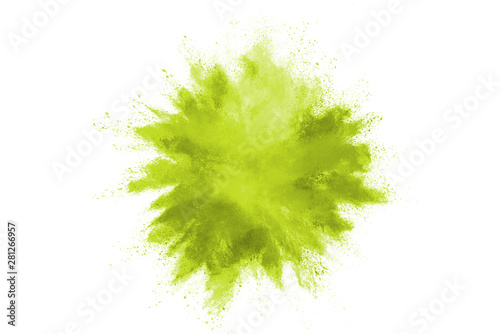 Green powder explosion on white background.