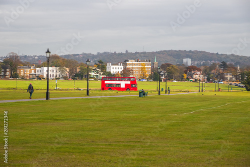 Photography A red London bus driving through the Blackheath
