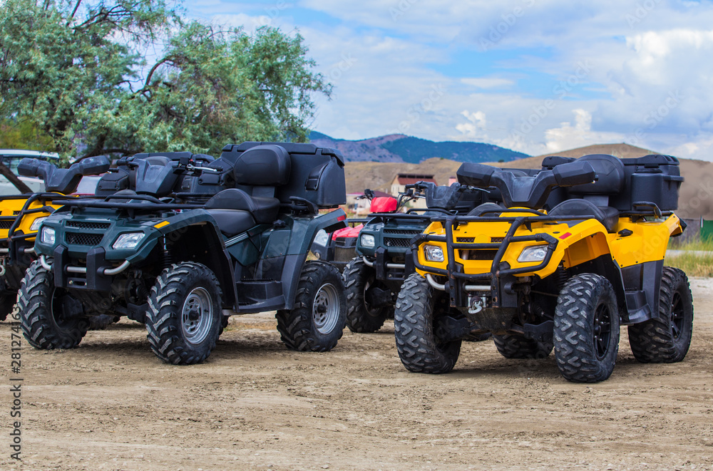 ATVs in the parking lot
