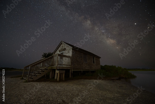 Milky Way over a shack in Assateague Island 