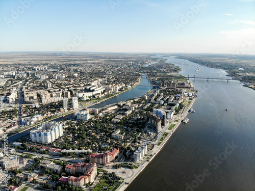 Astrakhan. Panorama of the city of Astrakhan. The bridge over the highway bridge across the Volga. Monument to Peter 1 on the central embankment of the city, a park for recreation and walks.