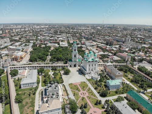 Astrakhan. Astrakhan Kremlin. Fortress. Assumption Cathedral and the bell tower of the Astrakhan Kremlin. Flying drone over the Kremlin. Panorama of the city of Astrakhan.