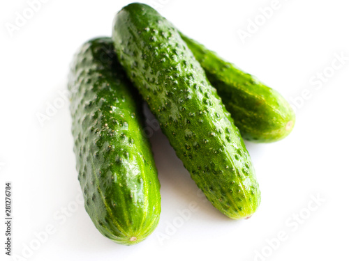 fresh cucumbers on white background, homemade gherkins isolate  