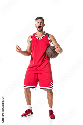 yelling basketball player with clenched hand and ball Isolated On White