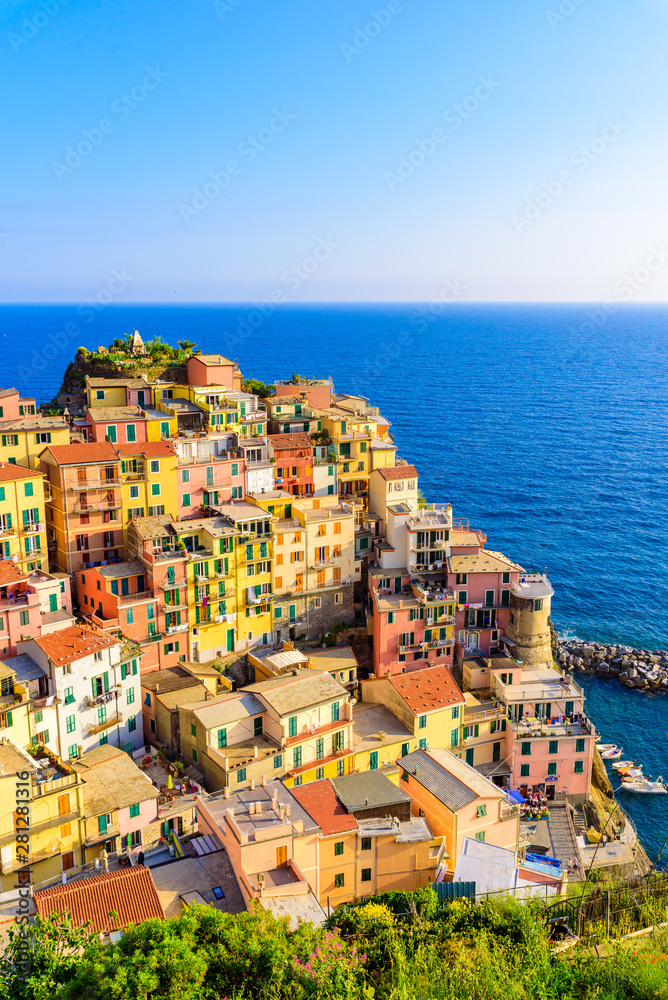 Manarola village in beautiful scenery of mountains and sea - Spectacular hiking trails in vineyard with flowers in Cinque Terre National Park,  Liguria, Italy, Europe
