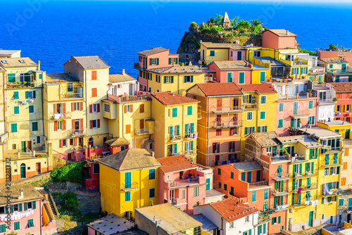 Colorful houses in Manarola Village in Cinque Terre National Park. Beautiful scenery at coast of Italy. Fisherman village in the province of La Spezia, Liguria, Italy photo