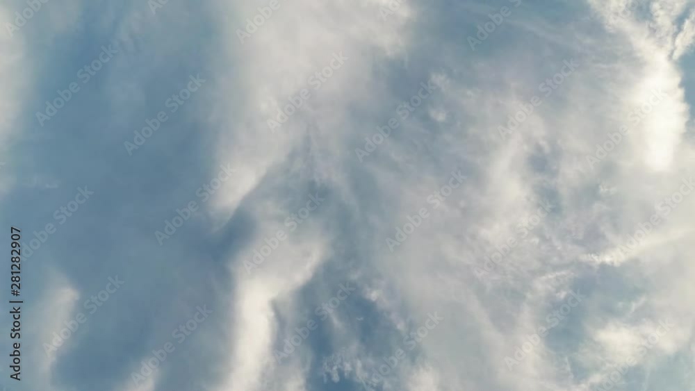 Blue cloudy sky is flowing. Scene of beautiful cloudscape in the afternoon. Blue cloudy sky is flowing. Scene of beautiful cloudscape in the afternoon.