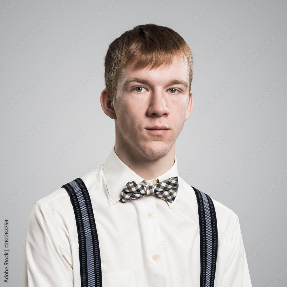 Boy having serious and calm face. Photos | Adobe Stock