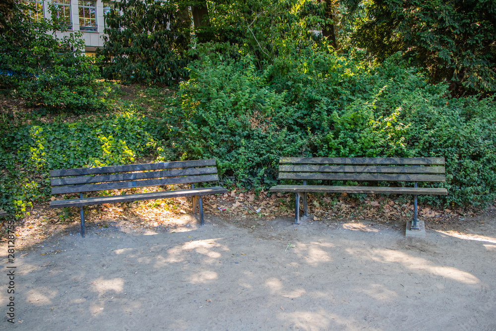 Garden benches in a wooded park great for rest, around the world (collection of benches) Garden benches in a wooded park great for rest, around the world (collection of benches)