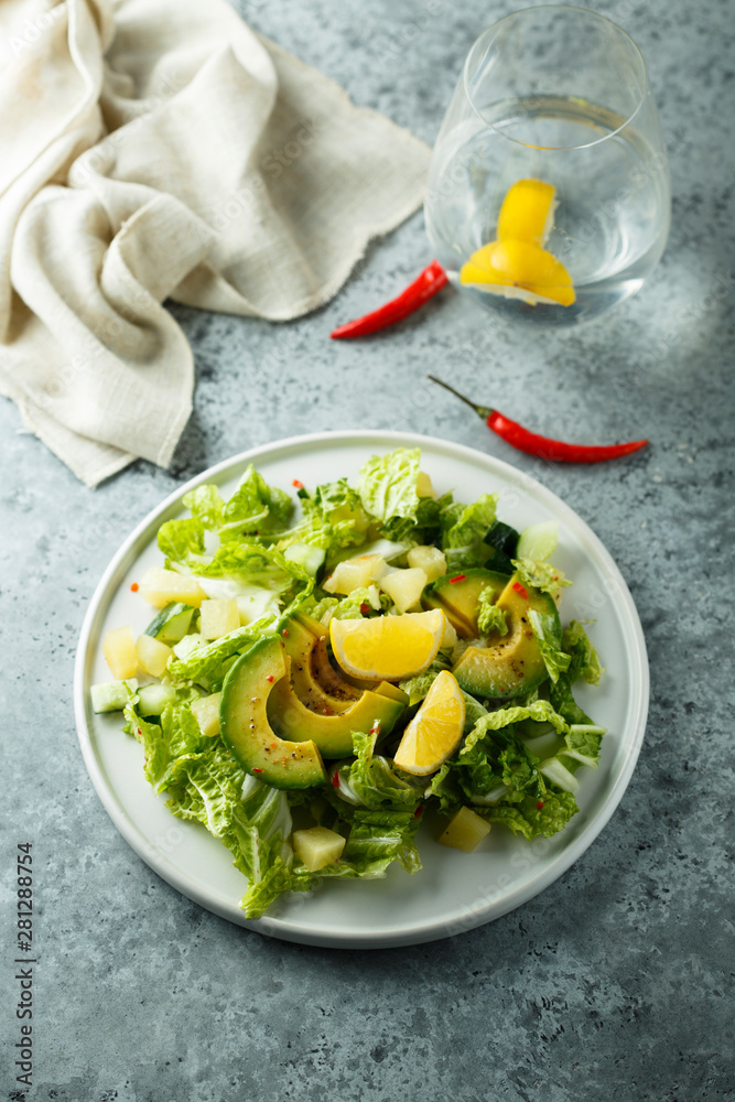 Healthy avocado salad with lemon dressing