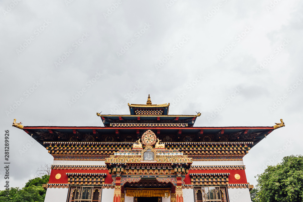 Colorful decorated facade in Bhutanese style of The Royal Bhutanese Monastery with copy space in Bodh Gaya, Bihar, India.