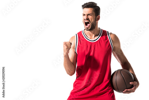 excited athletic basketball player in uniform with ball Isolated On White with copy space photo