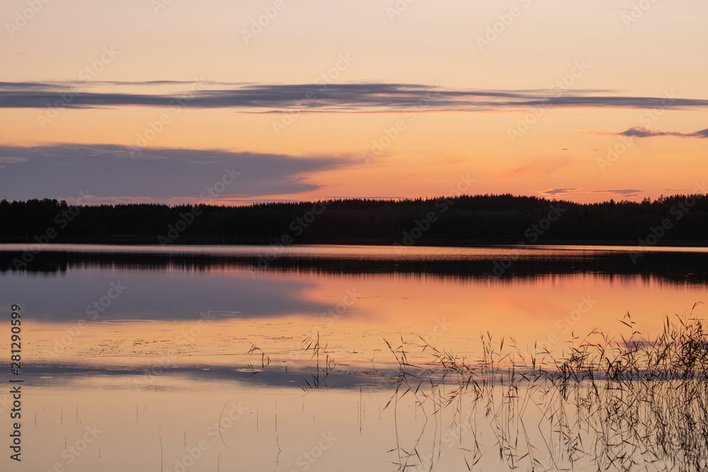 Fototapeta premium sunset over the lake