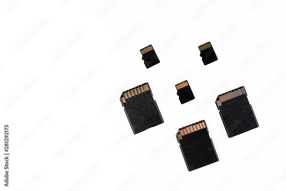 three sd cards and three micro sd scattered isolated in white background three sd cards and three micro sd scattered isolated in white background