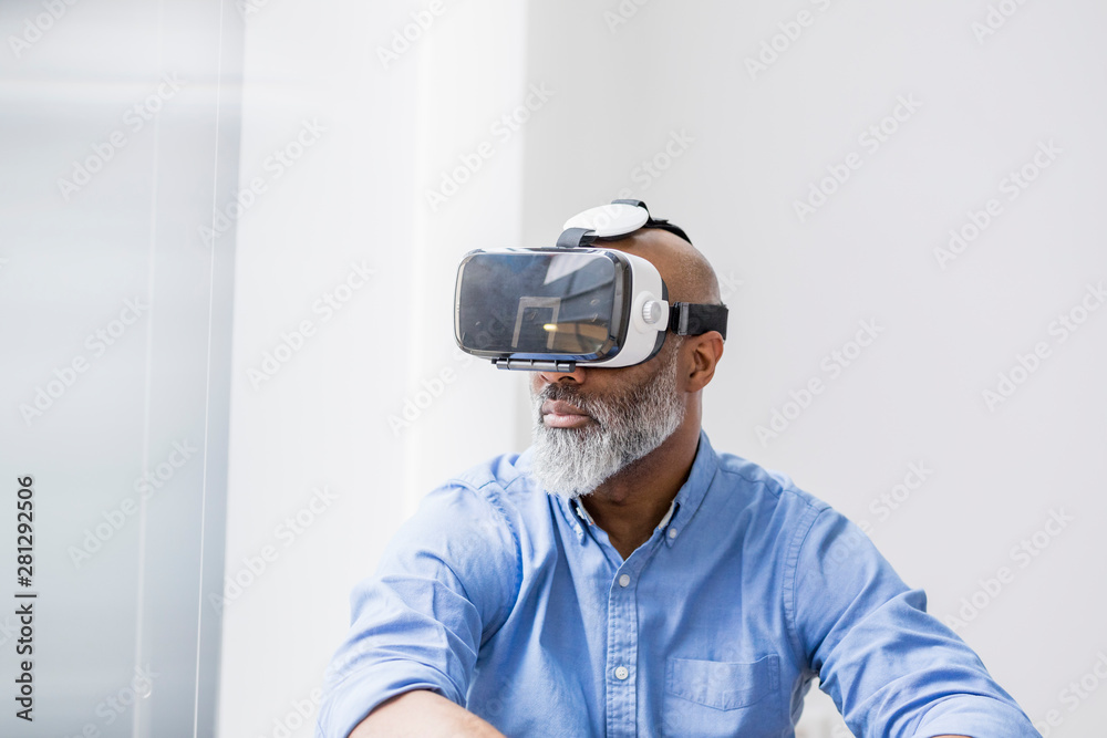Businessman using Virtual Reality Glasses Businessman using Virtual Reality Glasses