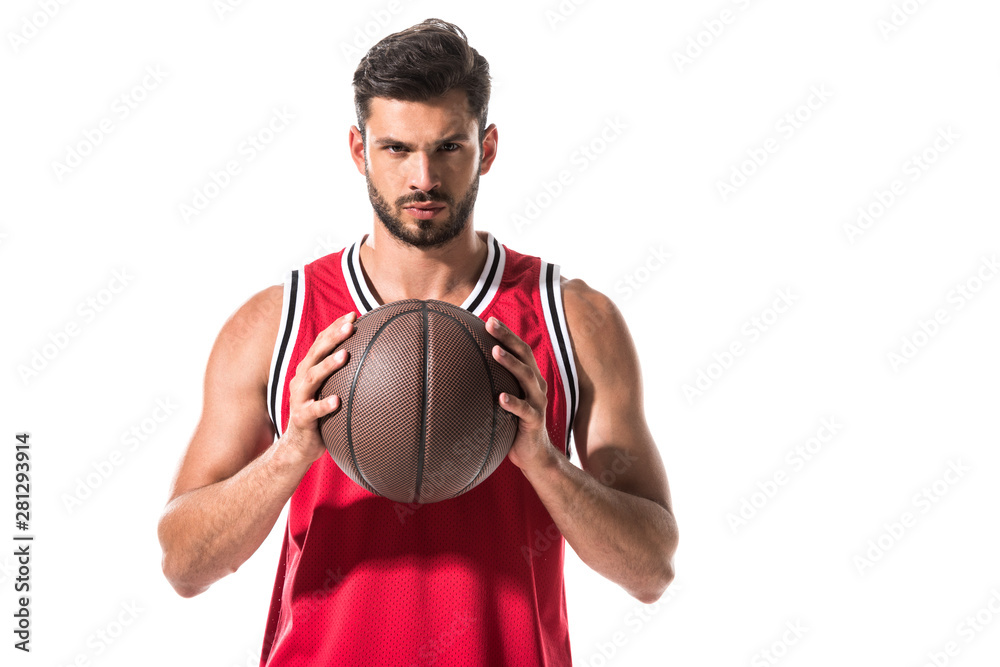 serious athletic basketball player in uniform with ball Isolated On