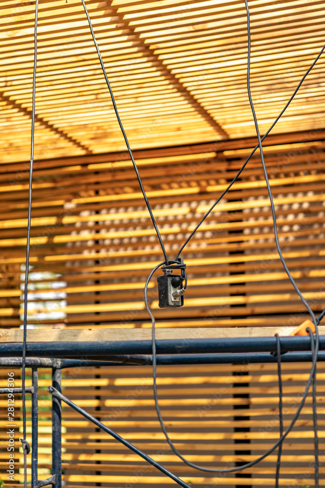 The constructor sets the power plug and electric cable connects together by hanging top of the floor to avoid from walking away.