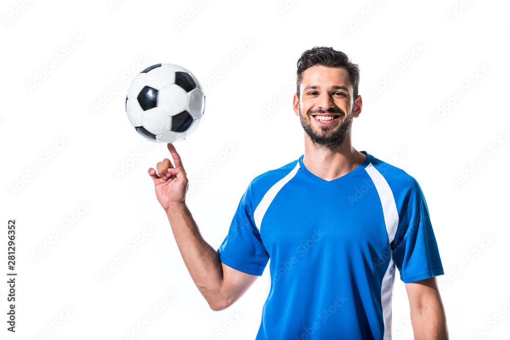 smiling handsome soccer player spinning on finger ball Isolated On White smiling handsome soccer player spinning on finger ball Isolated On White