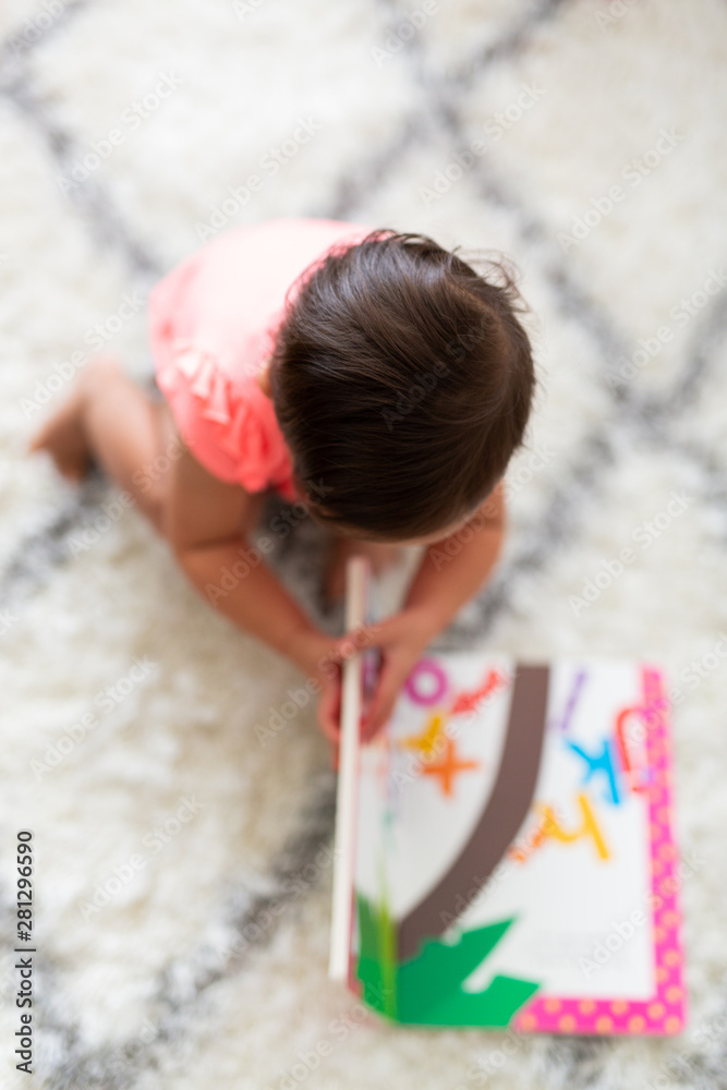 Toddler Girl Playing and Exploring with Montessori Lessons Toddler Girl Playing and Exploring with Montessori Lessons