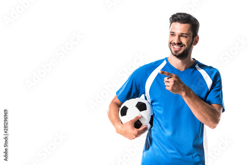 happy soccer player with ball pointing with finger Isolated On White © LIGHTFIELD STUDIOS