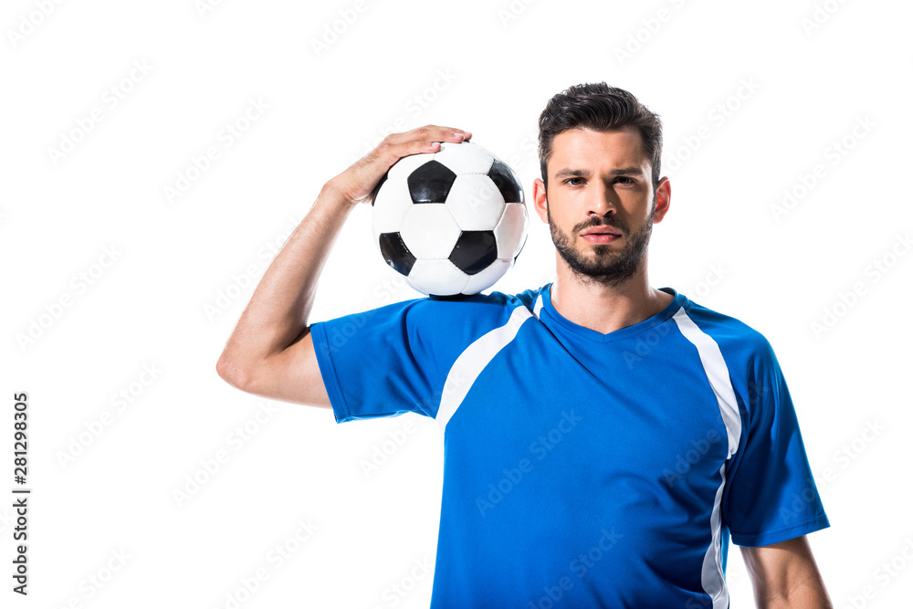handsome soccer player looking at camera and holding ball Isolated On White handsome soccer player looking at camera and holding ball Isolated On White