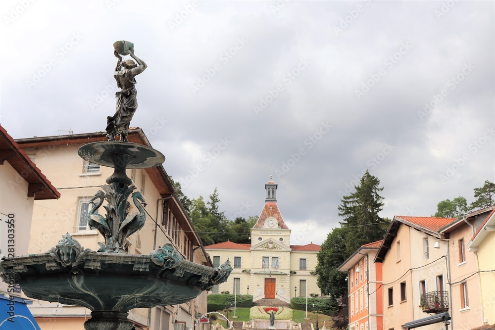 Fototapeta premium Fontaine de la place des Terreaux - village de Saint Jean de Bournay - Département Isère - France