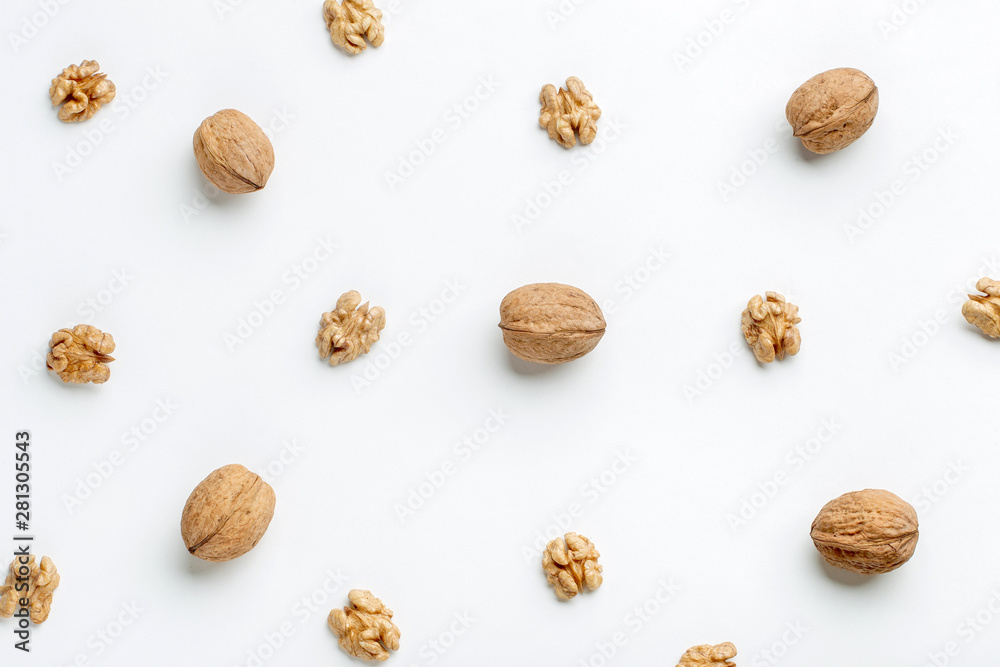 Composition of nuts pattern on white background Composition of nuts pattern on white background