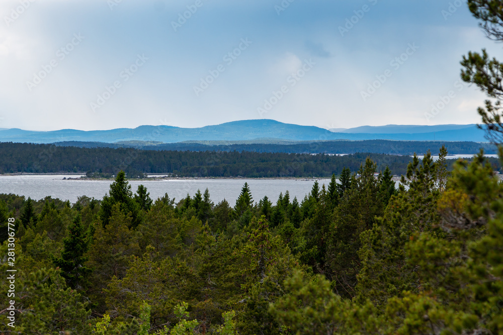 Beautiful typical Swedish landscape with lakes and forest and hills 