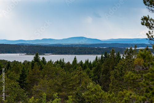Beautiful typical Swedish landscape with lakes and forest and hills  photo
