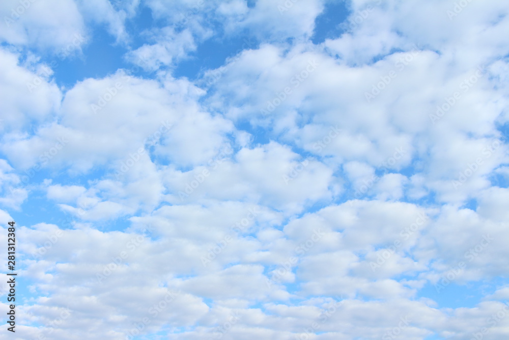 Fototapeta premium many cumulus clouds in the blue sky