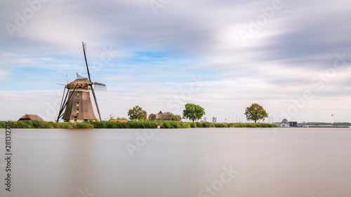 Old Dutch traditional windmill located at Rottemeren photo