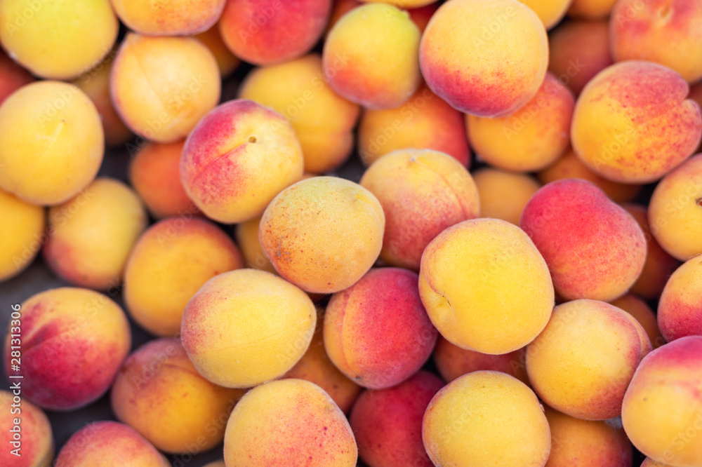 Fresh raw juicy tasty apricot background. Organic sweet natural orange delicious summer fruits