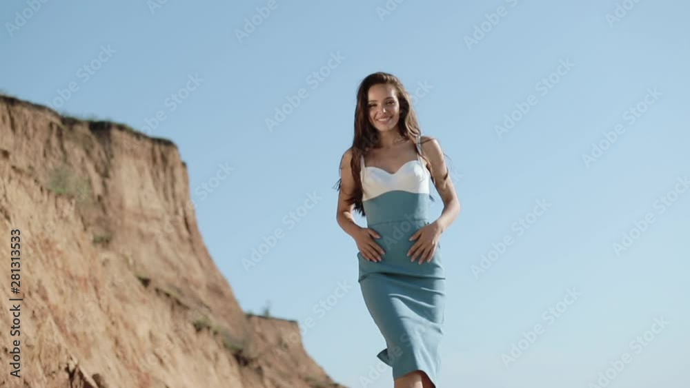 Attractive Girl Is Enjoying At Sea Coast On Summer Vacation Happy Day. Attractive Girl Is Enjoying At Sea Coast On Summer Vacation Happy Day.