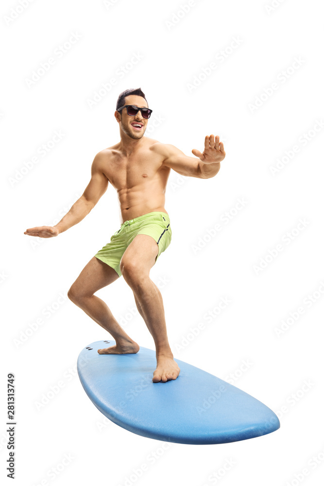 Attractive young surfer on a surfboard Attractive young surfer on a surfboard