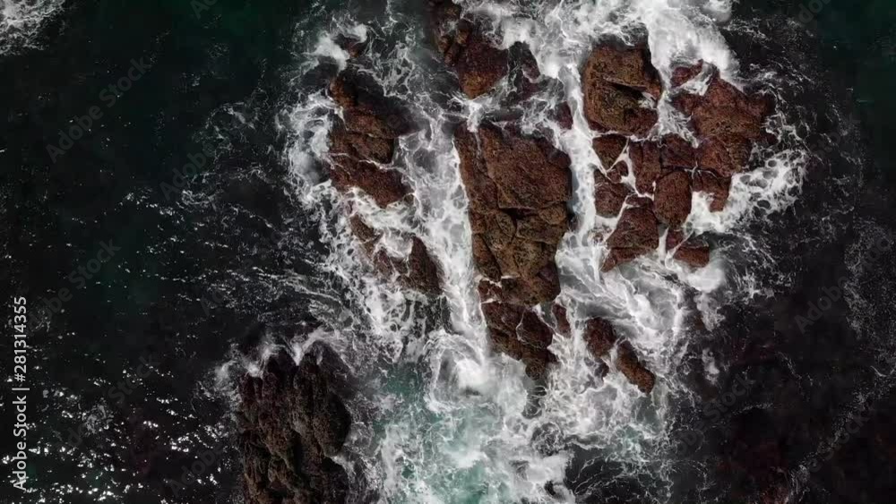 Drone view of rocks and water in the sea Drone view of rocks and water in the sea