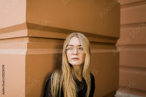 Young Blond Woman With Retro Glasses photo