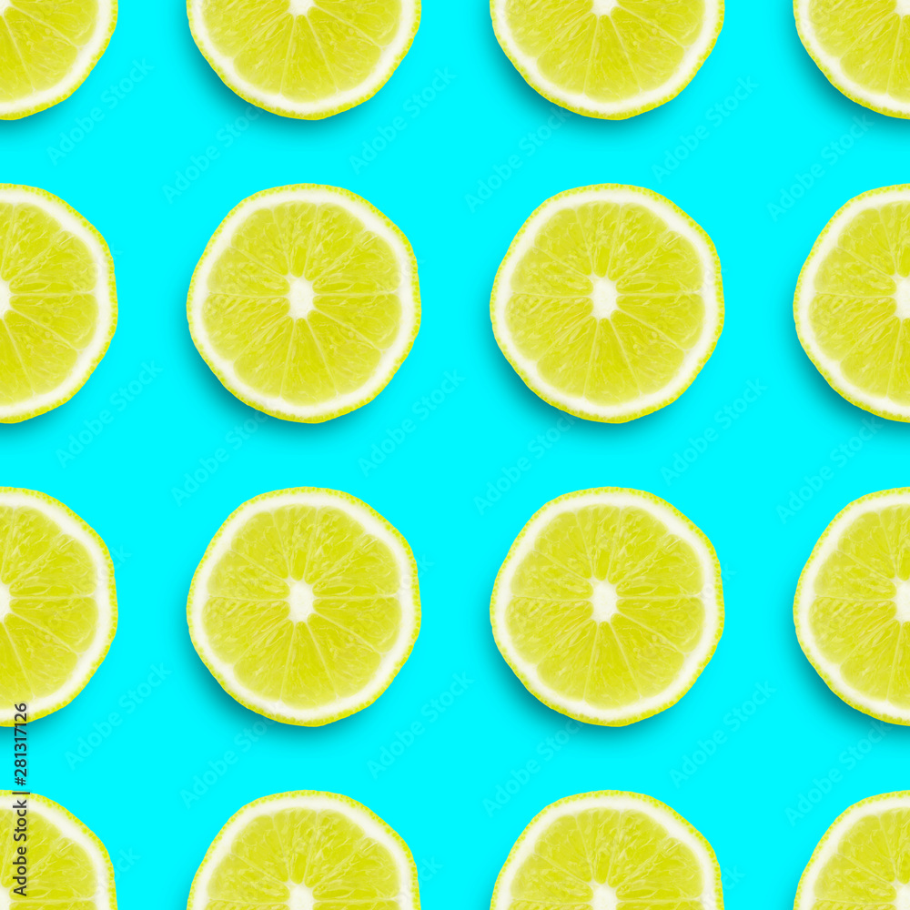 seamless texture,  lemon sliced ​​into rings on a colored background