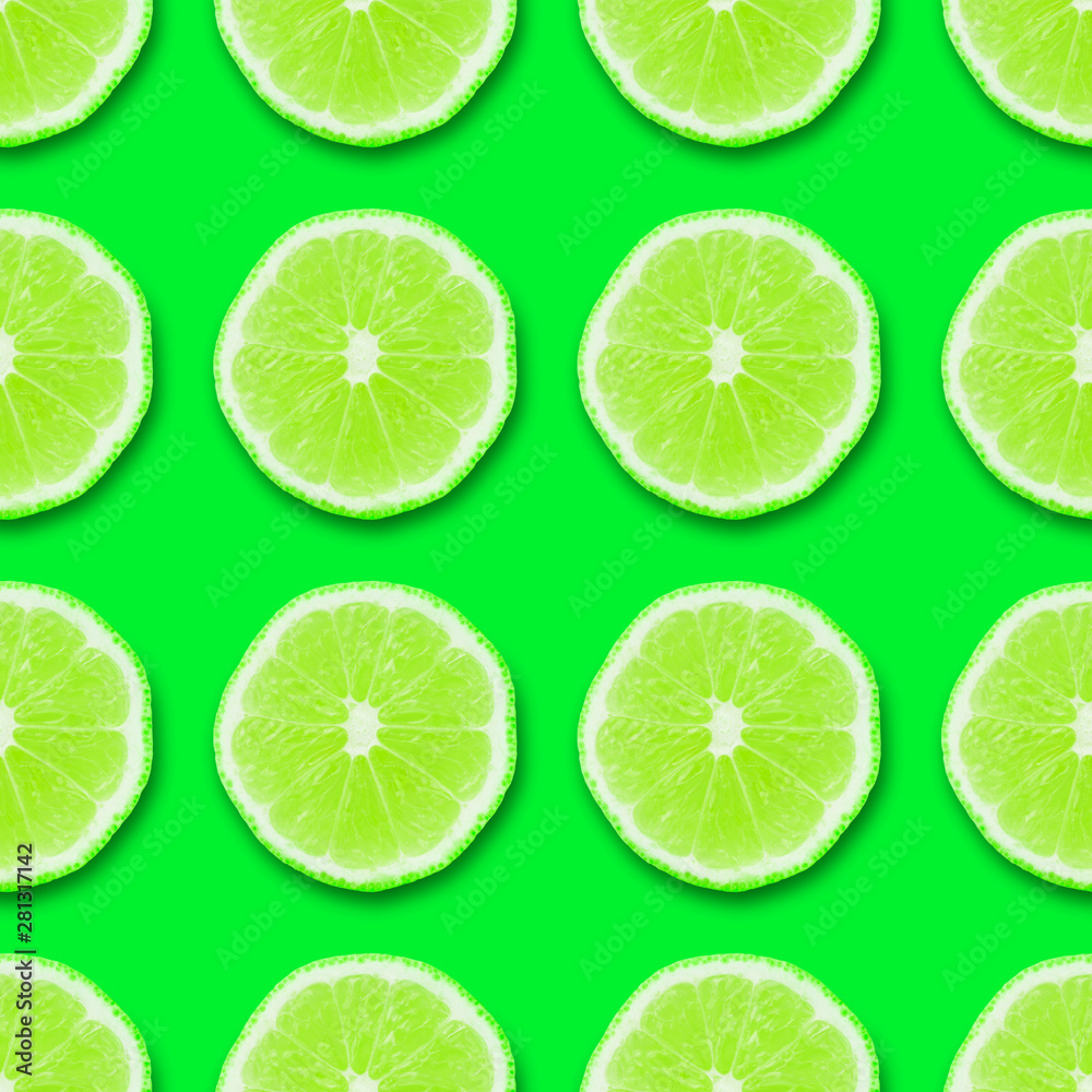 seamless texture,  seamless texture,  lime sliced ​​into rings on a colored background