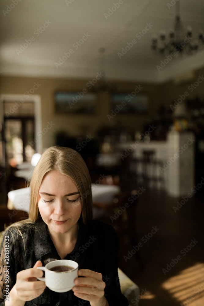 Young Woman Inside The Coffee Shop Young Woman Inside The Coffee Shop
