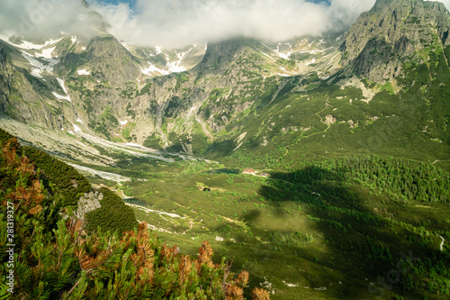 High Tatras mountain range and valley with green lake