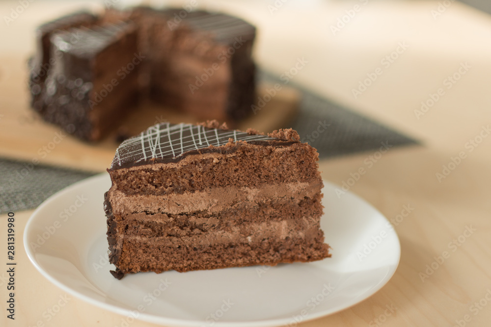 Chocolate cut cake top view. Sweet chocolate pie.