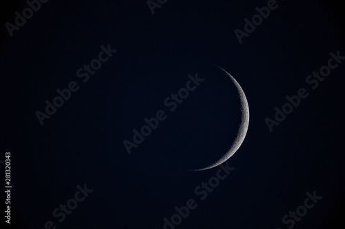 The last phase of a crescent moon.